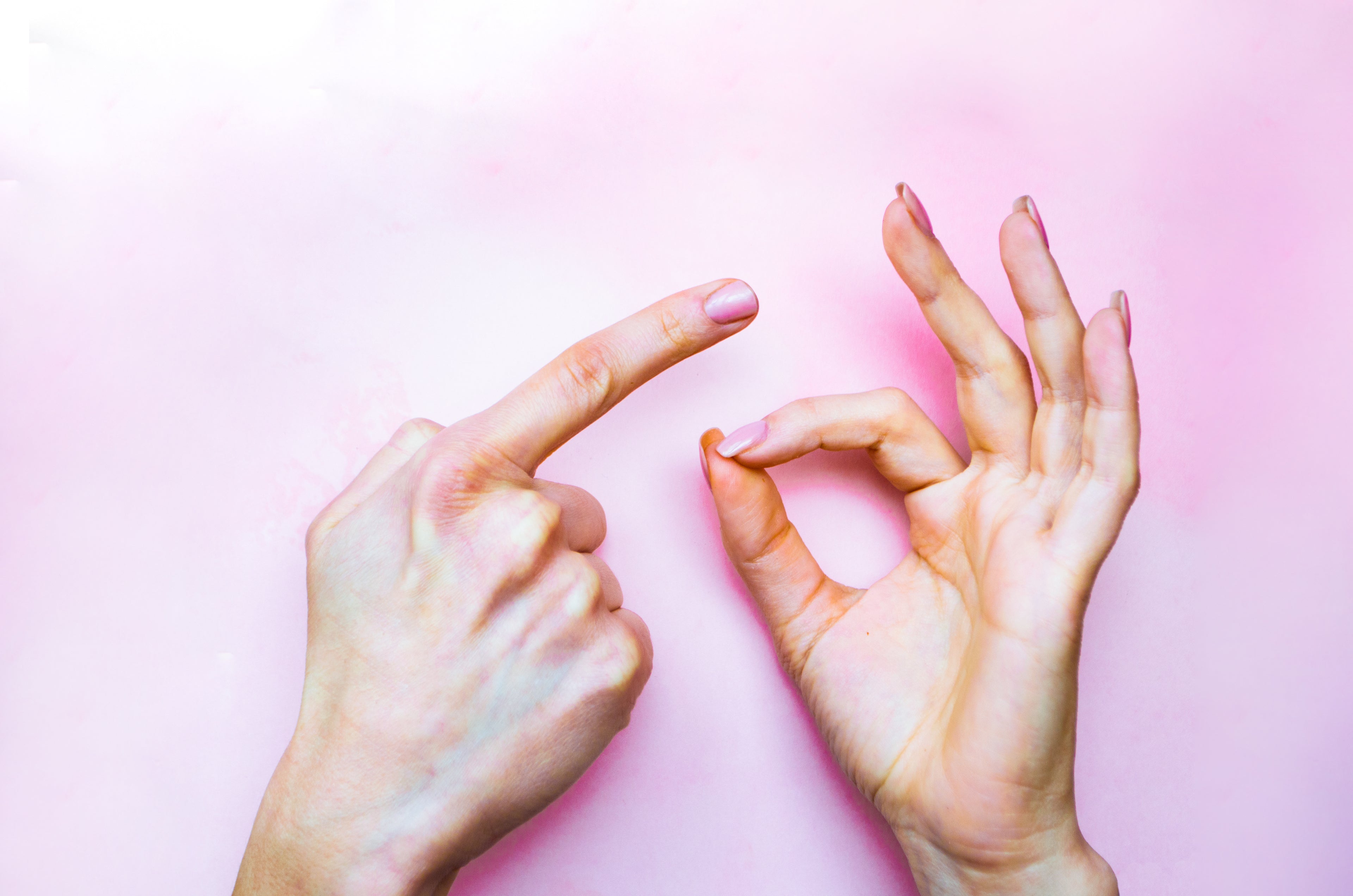 A set of hands making the universal sign for sex Boink Adult Boutique Adult Sex Toys Lubricants